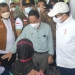 VAKISNASI COVID-19 - Menteri PPN/Bappenas, Suharso Monoarfa bersama Bupati Gorontalo, Nelson Pomalingo, Wakil Bupati, Hendra Hemeto, saat meninjau pelaksanaan vaksinasi di Sport Center Limboto, Sabtu (9/10/2021). Foto : Putra/Gopos.