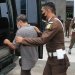DPO, Yancen Tangkilisan alias Ko' Yancen terpidana dalam perkara tindak pidana kehutanan, tiba di Kejati Gorontalo, Senin (11/10/2021). Foto : istimewa