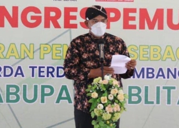 Kepala Dinas Pariwisata, Kebudayaan, Pemuda dan Olahraga (Disparbudpora) Kabupaten Blitar, Suhendro Winarso dalam sambutannya dalam pembukaan Kongres Pemuda, di Pendopo Ronggo Hadi Negoro, Kamis (28/10/2021). (Foto: istimewa)