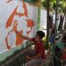 Mural Festival 2021 - Peserta Mural Festifal 2021 yang diselenggarakan oleh Polda Gorontalo di Lapangan Olahraga David-Tony, Kabupaten Gorontalo, Sabtu (30/10/21). (Foto: Abin/Gopos)