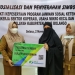 Sosialisasi sekaligus penyerahan simbolis tanda bukti kepesertaan program Jamsostek bagi pelaku sektor koperasi, usaha mikro kecil dan menengah di wilayah Kabupaten Bone Bolango, di ruang Multi Fungsi MPP Bone Bolango, Selasa (2/11/2021). (Foto istimewa)