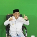 Bupati Gorontalo, Nelson Pomalingo saat berpose Salam Literasi yang juga menandakan LTKL Dan Festival Kabupaten Lestari. (Foto : Istimewa).