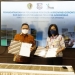 penandatanganan adendum dana PEN Kota Gorontalo, antara Wali Kota Gorontalo, Marten Taha dengan pimpinan PT. SMI selaku pengelola dana PEN di Jakarta, Rabu (1/12/2021). Foto (Diskominfo Kota Gorontalo