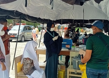 Kegiatan vaksinasi massal yang berlangsung di Lapangan Taruna Remaja Kota Gorontalo, Sabtu (4/12/2021) lalu. (sari/gopos)