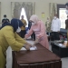 Proses pelantikan Ketua Dekranasda Bone Bolango, Lolly Pou Yunus yang disaksikan langsung oleh Bupati Bone Bolango, Hamim Pou. (Foto Irul/Diskominfo)