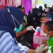 Salah seorang remaja mengikuti vaksinasi Covid-19 yang dilaksanakan oleh BINDA Gorontalo bekerja sama Forkopimda Provinsi Gorontalo dan Pemkab Bone Bolango di Lapangan Likada, Suwawa, Bone Bolango, Jumat (17/12/2021). (Istimewa)