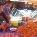 Ismail Umar warga asal kelurahan Kayubulan, Kecamatan Limboto yang juga penjual cabai ini mengaku harga cabai kurang lebih dua hari terakhir ini mengalami penurunan sementara harga Tomat meningkat di pasar mingguan Limboto. (Foto: Putra/Gopos)