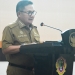 Wali Kota Gorontalo, Marten Taha saat memberikan arahan di kegiatan Rakorev Penyerapan Anggaran Kota Gorontalo Triwulan IV Tahun Anggaran 2021 di Bantayo Lo Yiladiya, Rumah Dinas Wali Kota Gorontalo, Senin (10/1/2022). (Foto: Putra/Gopos)