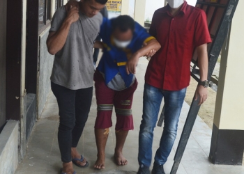 Salah satu pelaku pencurian di sebuah toko pertanian di Kecamatan Telaga, UD alias Usu (48) yang juga merupakan otak pelaku pencurian, (Foto: Putra/Gopos)