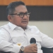 Wali Kota Gorontalo, Marten Taha saat mengikuti kegiatan rapat forkompinda se-provinsi Gorontalo terkait pembahasan percepatan vaksinasi dan keamanan stabilitas daerah di Banthayo Lo Yiladiya, Rumah Dinas Wali Kota Gorontalo, Rabu (12/1/2022). (Foto: Putra/Gopos)