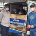 Kepala Dinas Kependudukan dan Pencatatan Sipil Kabupaten Bone Bolango, Oktavianus Rahman saat mendampingi Bupati Hamim Pou dan Ketua Tim Penggerak PKK dalam meninjau pelayanan pengurusan KTP secara mobile. (Foto Istimewa)