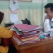 Kades Buntulia Jaya saat menyampaikan laporan ke Polres Pohuwato