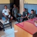 Proses mediasi perkelahian dua warga Popayato dengan Plh Danramil Moutong di Polsek Popayato, Rabu (12/1/2022). (istimewa)