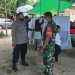 Personel Polsek Batudaa dan Koramil Tabongo mengawal di rumah korban di Dusun Balangga Selatan, Desa Payunga, Kecamatan Batudaa