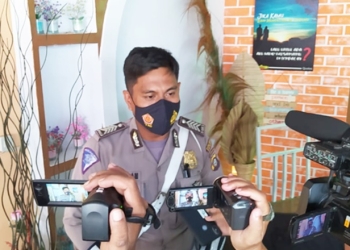 Kanit Keamanan dan Keselamatan (Kamsel), Lantas Polres Bone Bolango, Bripka Erik A Adam saat diwawancarai awak media, Rabu (19/1/2022). (Foto: Putra/Gopos)