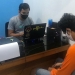 Petugas Polsek Kota Timur memeriksa AHA terduga pelaku pencurian handphone. (Humas Polres Gorontalo Kota)