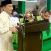 Bupati Gorontalo Nelson Pomalingo mengadakan evaluasi kinerja aparat desa bersama seluruh aparat desa se Kabupaten Gorontalo di GOR David-Tonny, Jumat (28/1/2022). (Foto: Istimewa