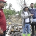 Bupati Gorontalo Nelson Pomalingo saat meninjau jembatan, jalan dan bendungan yang ambruk akibat diterjang banjir di Desa Molowahu, Kecamatan Tibawa, serta jembatan biyonga yang dihantam banjir di sejumlah Kelurahan dan Kecamatan Limboto, Ahad (20/3/2022). (foto: istimewa)