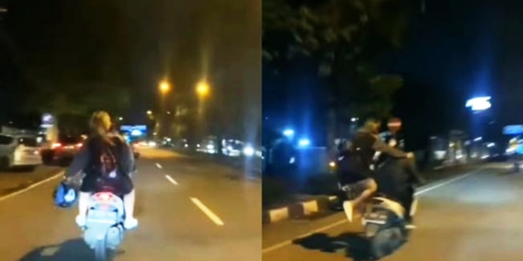 Perempuan nekat loncat dari motor. (Suara.com)