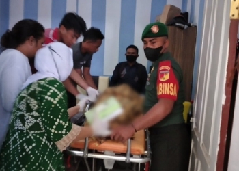 Seorang perempuan berusia 32 tahun, TMHK, ditemukan dalam keadaan tak bernyawa di dalam kamar di rumahnya di Dusun Monggelomo, Desa Isimu Utara, Kecamatan Tibawa, Kabupaten Gorontalo, Rabu (20/4/2022). (Foto: Istimewa)