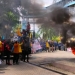 Ratusan aliansi mahasiswa melakukan demonstrasi di Halaman depan kantor DPRD Kabupaten Gorontalo, Senin (11/4/2022). (Foto: Putra/Gopos)