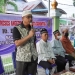 Anggota DPRD Kota Gorontalo, Erman Latjenke, ketima memberikan sambutan dalam kegiatan reses bertempat di Kelurahan Buladu, Kota Gorontalo, Minggu (24/4/2022). (fahrun/gopos)