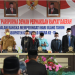 Gubernur Gorontalo Rusli Habibie (kemeja khaki) saat menghadiri Rapat Paripurna istimewa DPRD Gorontalo Utara dalam rangka memperingati Hari Ulang Tahun ke-15 Kabupaten Gorontalo Utara, Selasa (25/2/2022). (Foto: Salman)