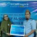 Kepala Cabang WOM Finance, Iswahyuddin Ilham  saat menyerahkan bantuan Al-Qur'an secara simbolis kepada Pembina Yayasan Ulumul Qur’an Gorontalo, Dr.Hj Saida Gani. (foto.istimewa)