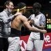 Pebulutangkis ganda putra India, Satwiksairaj Rankireddy (kanan) dan Chirag Shetty (tengah) meluapkan kegembiraanya dengan pelatih usai mengalahkan ganda putra Indonesia, Mohammad Ahsan dan Kevin Sanjaya Sukamuljo dalam pertandingan babak final Piala Thomas 2022 di Impact Arena, Bangkok, Thailand, Minggu (15/5/2022) sore WIB. (Suara.com)