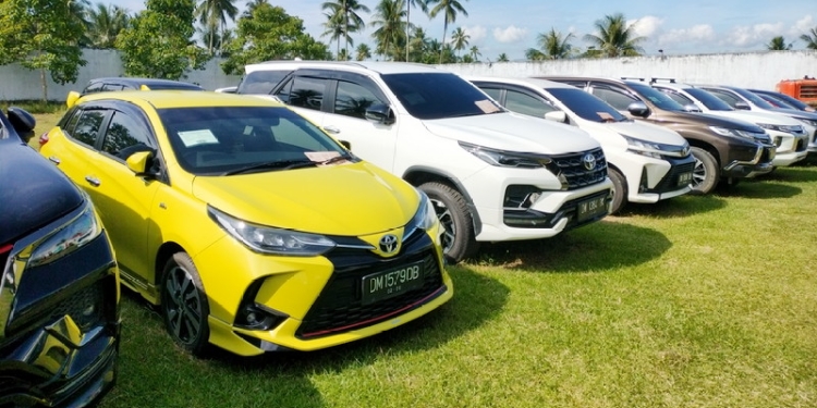 Puluhan mobil sitaan hasil investasi ilegal forex kini tersimpan di Rumah Penyimpanan Bendan Sitaan Negara (Rupbasan) Kelas I Gorontalo. (Foto: Putra/Gopos)