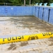 Kondisi terkini Kolam Pemandian Lombongo, Kabupaten Bone Bolango yang ditutup dan dipasang garis polisi. (Foto: Putra/Gopos)