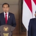 Presiden Joko Widodo atau Jokowi dan Wakil Presiden Maruf Amin di Bandara Soekarno-Hatta, Cengkareng, Banten pada Minggu (26/6/2022). (Suara.com)