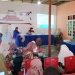 Kegiatan pemaparan data sekaligus penilaian Kampung KB di Desa Tenilo, Kecamatan Tilamuta, Kabupaten Boalemo. (Foto: Putra/Gopos)