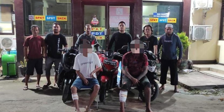 Dua pelaku pencurian sepeda motor di Kota Gorontalo diamankan Tim Rajawali Polres Gorontalo Kota, Jum'at (17/6/2022). Foto: istimewa.
