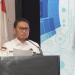 Penjagub Gorontalo, Hamka Hendra Noer saat memberikan sambutan pada kegiatan Rakorda penanggulangan kemiskinan dirangkaikan dengan peluncuran aplikasi GSD-Setia bertempat di Hotel Grand Q Kota Gorontalo, Jumat (10/6/2022). (Foto: Salman)