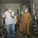 Penjagub Hamka didampingi istri drg. Gamariq Monoarfa saat meninjau proses produksi kelapa di PT Royal Coconut Gorontalo, Kabupaten Gorontalo, Senin (13/6/2022). Kelapa kelapa ini akan di ekspor ke negara negara tetangga dan Eropa. (Foto: Salman)