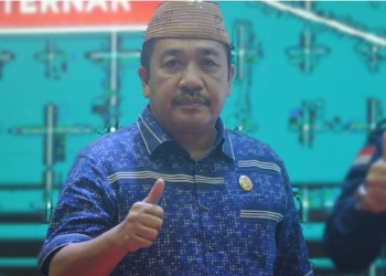 Ketua DPRD Bone Bolango, Halid Tangahu saat mengahdiri kegiatan Launching KUR di Auditorium Kabupaten Bone Bolango, Selasa (12/7/2022). (Foto: Putra/Gopos)