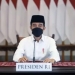 Presiden Joko Widodo (Jokowi) menyampaikan pidato dalam acara Takbir Akbar Virtual menyambut Hari Raya Idul Adha 2021 yang disiarkan kanal YouTube Sekretariat Presiden, Senin (19/7/2021). (Suara.com)