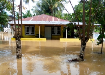 Beberapa rumah warga terdampak banjir tepatnya di Dusun Datahu, Desa Tilote, Kecamatan Boliohuto, Kabupaten Gorontalo, Jumat (15/7/2022). (Foto: Istimewa)