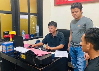 Terduga pelaku, saat menyerahkan diri ke Polsek Dungingi, Kota Gorontalo. Foto : istimewa