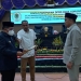 Wali Kota Gorontalo, Marten A. Taha, didampingi Wakil Wali Kota Gorontalo, Ryan F. Kono, menyerahkan dokumen KUA-PPAS kepada Ketua DPRD Kota Gorontalo, Senin (11/7/2022). (hasan/gopos)