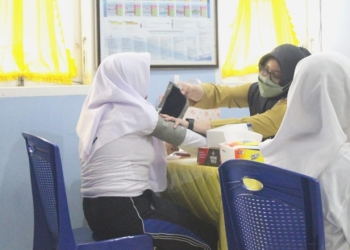 Pemeriksaan kesehatan bagi taruna/taruni SMK Bina Taruna Gorontalo dalam agenda PLS, Rabu (13/7/2022) (Dok. SMK)