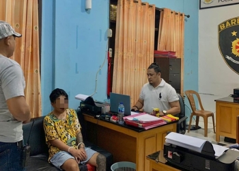 RI Alias Rendy (19) pelaku penganiayaan menggunakan senjata tajam diamankan di Mapolsek Kota Utara (istimewa)
