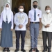 dua siswa siswi Pasukan Pengibar Bendera Pusaka (Paskibraka) asal Provinsi Gorontalo bersama penjabat Gubernur Hamka Noer didampingi Bupati Pohuwato dan Kepala Dikbudpora Provinsi Gorontalo, Jumat (15/7/2022). (Kominfo Provinsi Gorontalo)