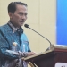 Bupati Gorontalo, Nelson Pomalingo saat menjadi Narasumber pada Kegiatan Pelatihan Peningkatan Kapasitas Staf Pemerintah Tentang Standard Operating Procedure – Good Agricutural Practices (SOP-GAP) Komoditi Pisang Gapi The Development of Integrated Farming System at Upland Areas (Upland Project) di Ballroom Hotel Damhil UNG, Kota Gorontalo, Rabu malam (24/8/2022). (Foto: Putra/Gopos)