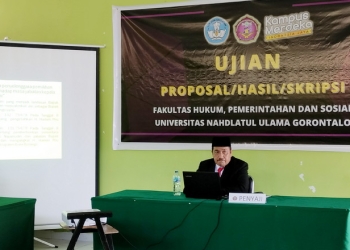 etua Dewan Perwakilan Rakyat Daerah (DPRD), Halid Tangahu mantap mengikuti ujian skirpsi sarjana hukum di Universitas Nahdatul Ulama Gorontalo (UNUGO), Rabu (31/8/2022). (Foto: Putra/Gopos)