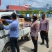 Kapolsek Dungingi, Iptu Pranti Natalia Olii beserta jajaran, saat berbagai bendera merah putih, Senin (8/8/2022). Foto: istimewa
