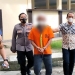 (i) (memakai rompi oranye) tersangka kasus korupsi pengadaan fasilitas gedung Poltekkes Kemenkes Gorontalo akhirnya dibekuk Kepolisian Daerah (Polda) Gorontalo. (Foto: Putra/Gopos)