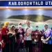 Thariq Modanggu saat foto bersama di stand Pemkab Gorut pada Apkasi Otonomi Expo tahun 2022. (foto.istimewa)