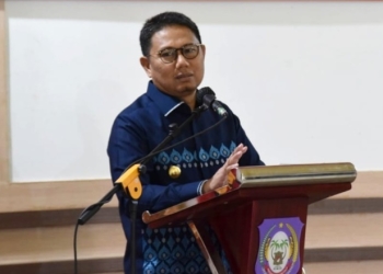 Penjabat Gubernur Gorontalo Hamka Hendra Noer saat memberikan sambutan pada Serah Terima Jabatan Ketua Dharma Wanita Persatuan Provinsi Gorontalo Tahun 2022 di Aula Rujab Dinas Wagub Gorontalo, Minggu (18/9/2022). (Foto: Fadly/Hms)